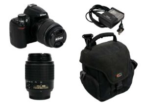 A Nikon D5000 fitted with a Nikon DX AF-S Nikkor ED 18-55mm lens.