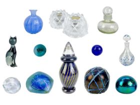 A collection of decorative glassware to include a Tiffany & Co paperweight.