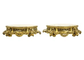 A pair of neo-classical French ormolu, shaped base mounts.