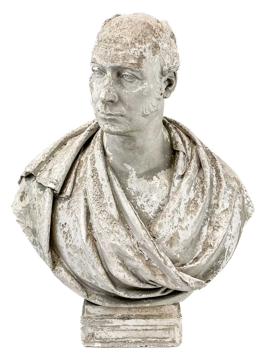 A 19th century weathered plaster bust of a gentleman wearing classical robes. The property of Peter