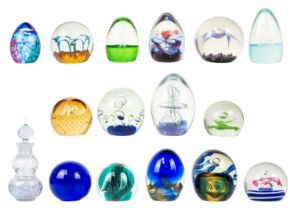 A collection of paper weights.