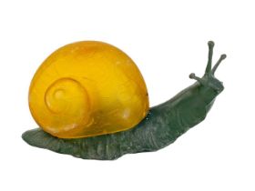 A novelty table lamp in the form of a snail.