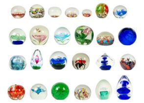 A collection of paper weights.