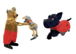 A Schuco clockwork tinplate tumbling mouse and a Scottie dog.