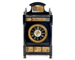 A Victorian Aesthetic movement slate mantel clock.