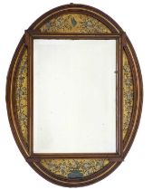 An Aesthetic Movement mahogany oval frame wall mirror.