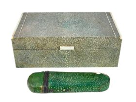 An Art Deco shagreen covered cigarette box.