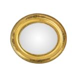 An Edwardian small oval gilt gesso wall mirror.