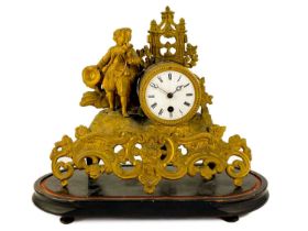 A French gilt metal figural mantel clock.