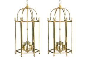 A pair of glazed brass hexagonal hall lanterns.