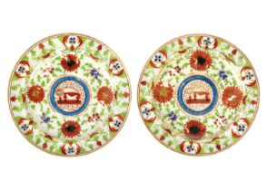 Two early 19th century Minton plates painted with the 'Crazy Cow' pattern.