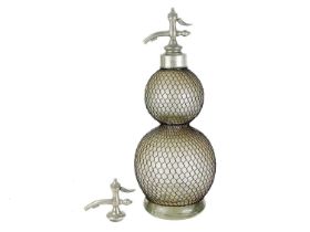 A large early 20th century glass double gourd soda siphon with wire mesh surround.