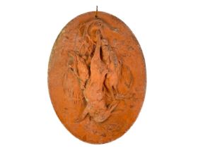 A late 19th century French terracotta oval plaque.