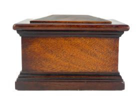 A 19th century mahogany puzzle box.