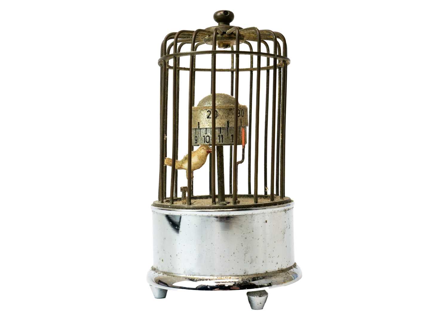 A novelty bird cage alarm clock.