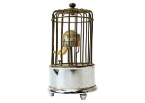 A novelty bird cage alarm clock.