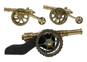 A brass model field gun cannon.