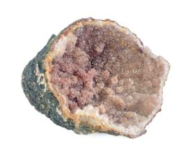 A pink amethyst geode mineral specimen.