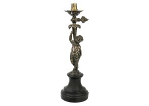 A French bronze cherub table lamp.
