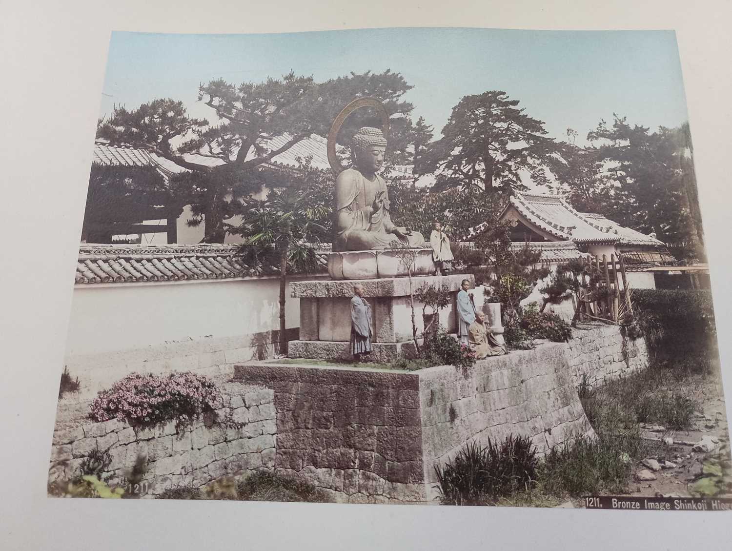 A Japanese hand coloured photo album with lacquer cover, Meiji period. - Image 32 of 52