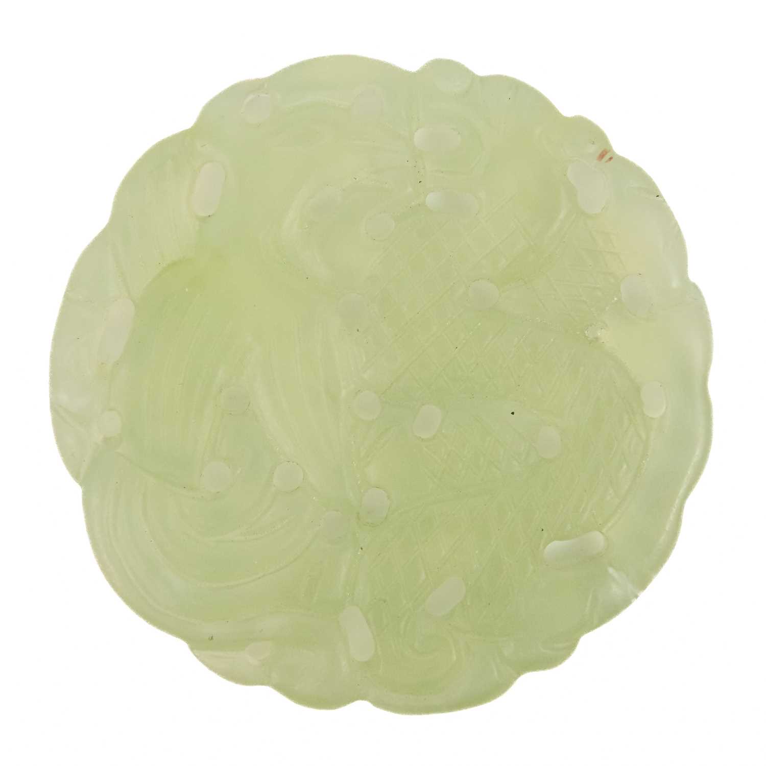 A Chinese carved jade roundel. - Image 2 of 2