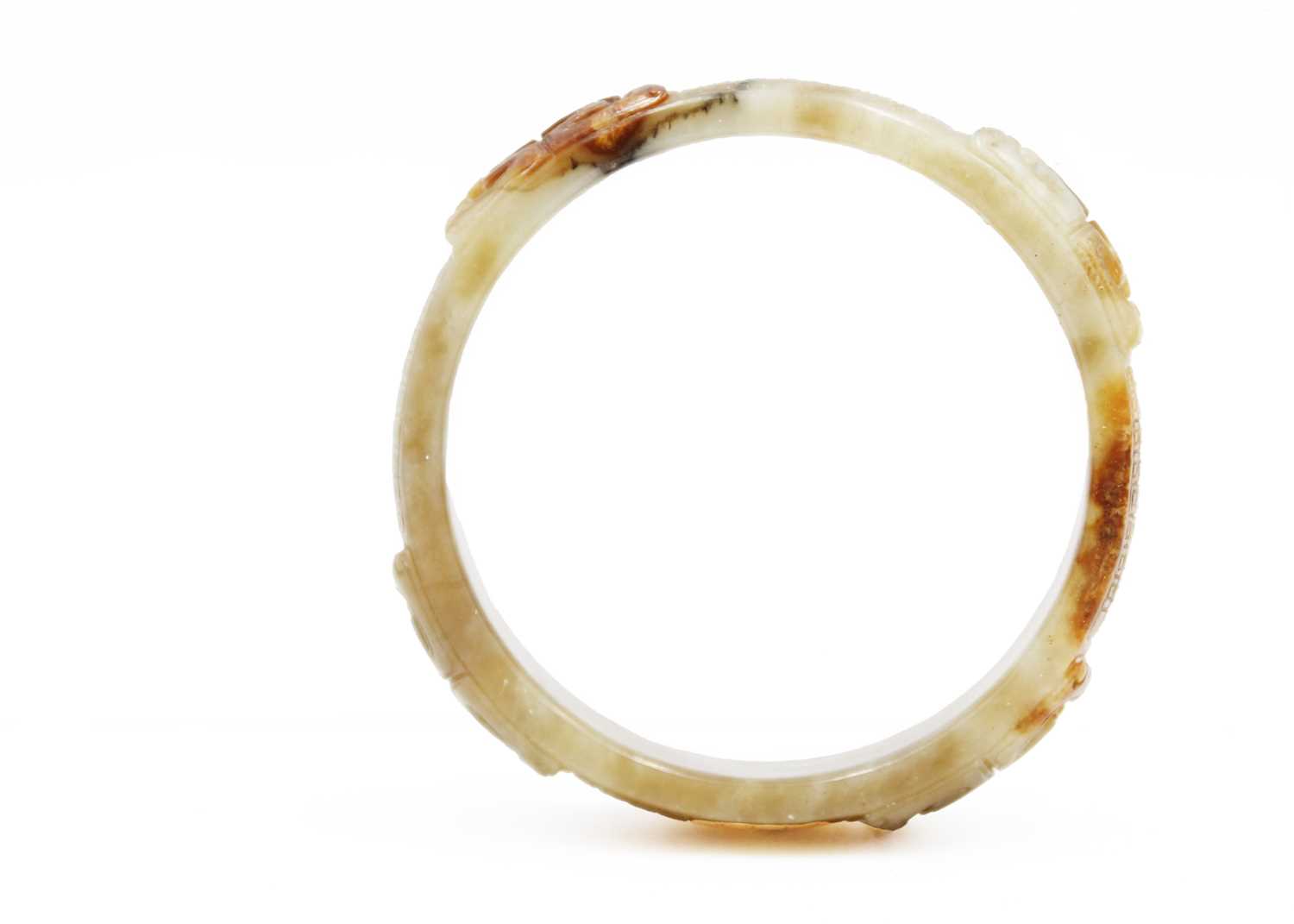 A Chinese carved jade bangle, probably Neolithic period. - Image 3 of 30