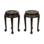 A pair of Chinese hardwood vase stands, early 20th century,