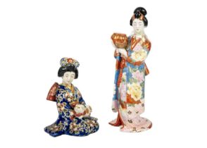 Two Japanese porcelain figures of Geisha girls, Meiji period.