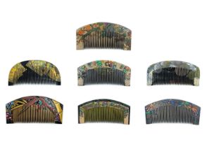 Seven various Japanese combs, each signed by the artist.