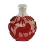 A Chinese red overlay glass snuff bottle.
