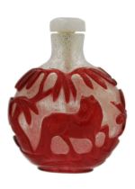 A Chinese red overlay glass snuff bottle.