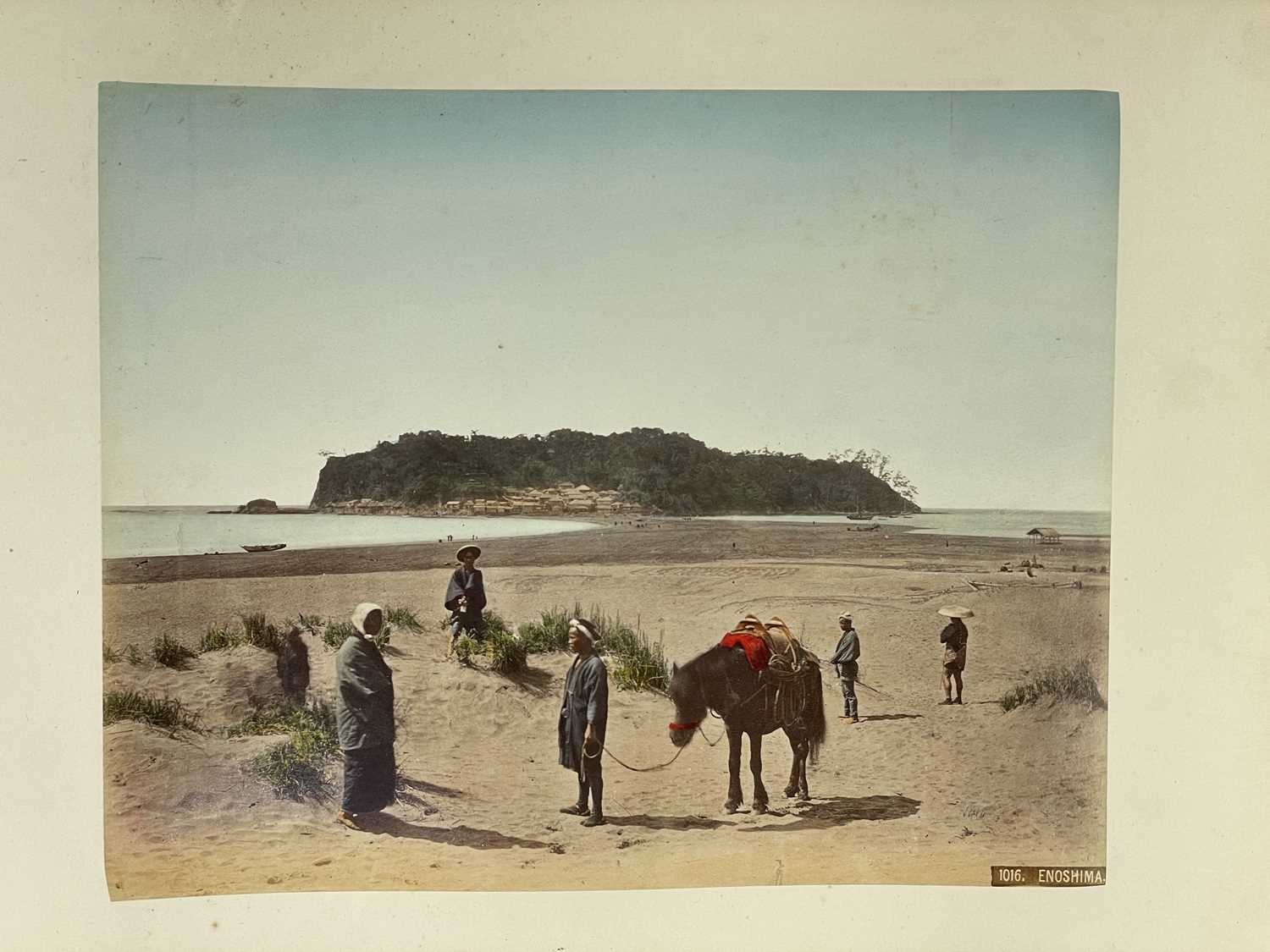 A Japanese hand coloured photo album with lacquer cover, Meiji period. - Image 2 of 52