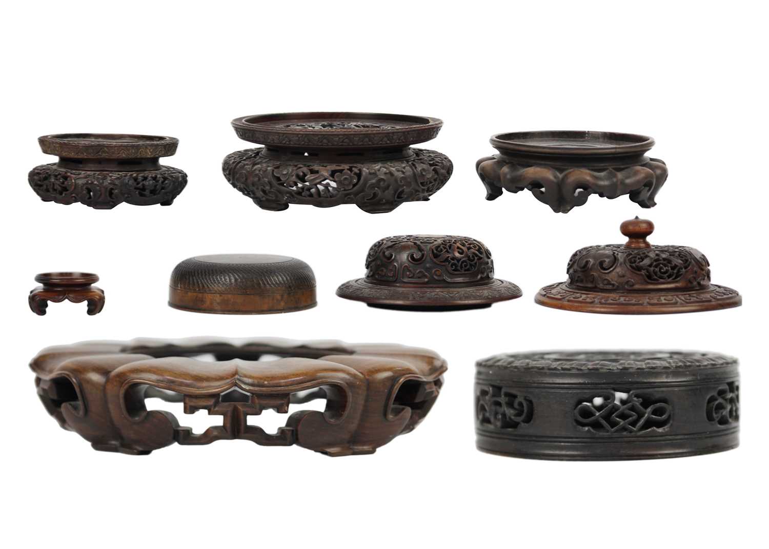 Various Chinese carved wood stands and covers, 19th/20th century.