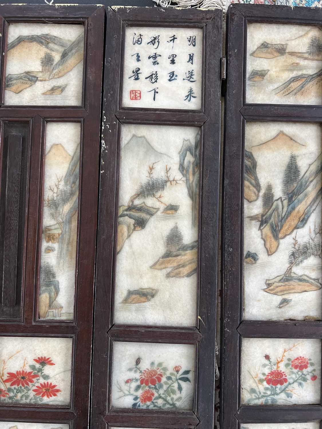 A Chinese alabaster and hardwood seven paneled screen, Qing Dynasty, late 19th century. - Image 13 of 16
