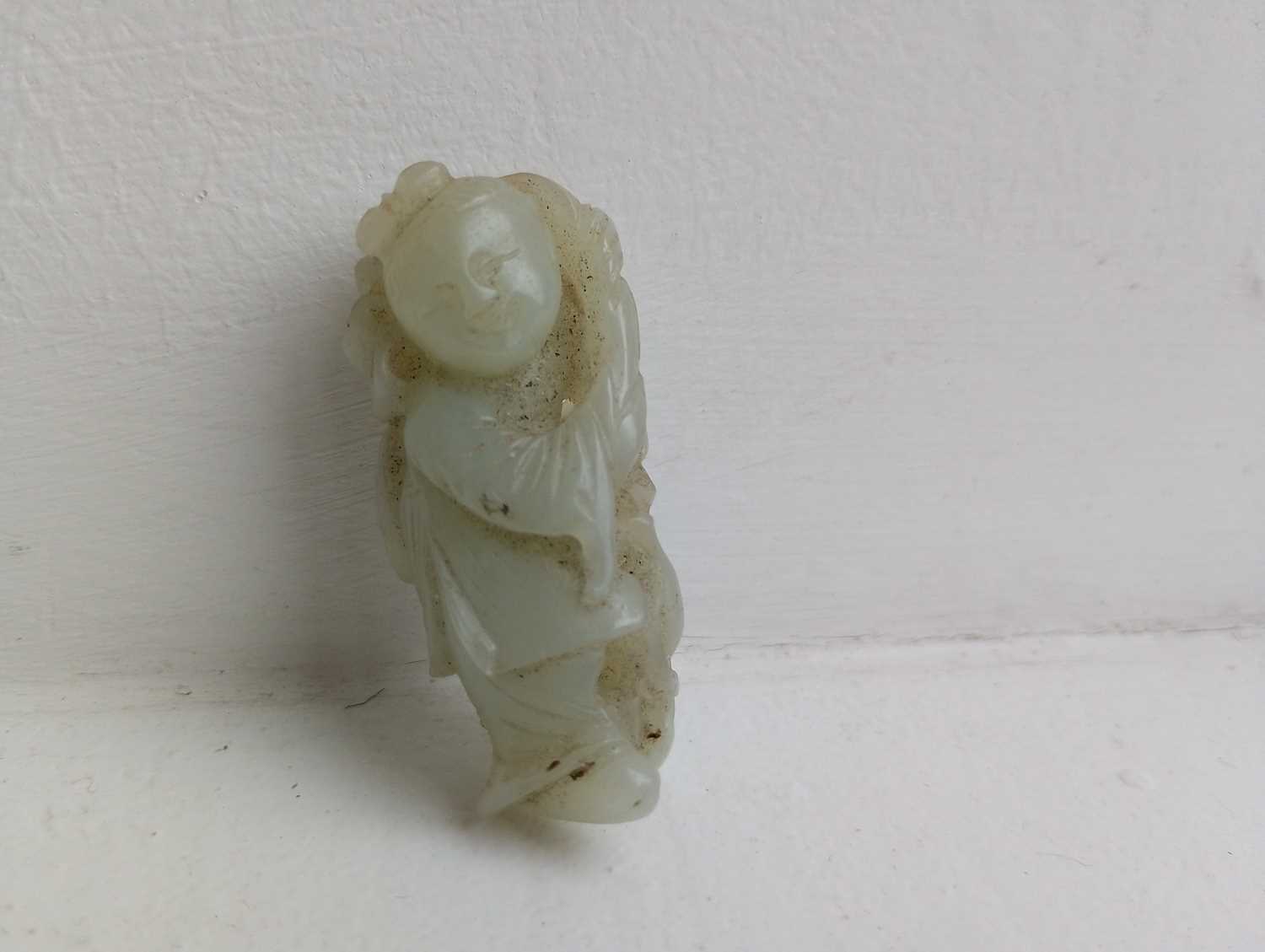 A Chinese carved jade figure of a boy, Qing Dynasty, 19th century, - Image 6 of 9