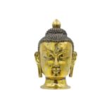 A Sino-Tibetan gilt bronze head of a Buddha, 19th century.