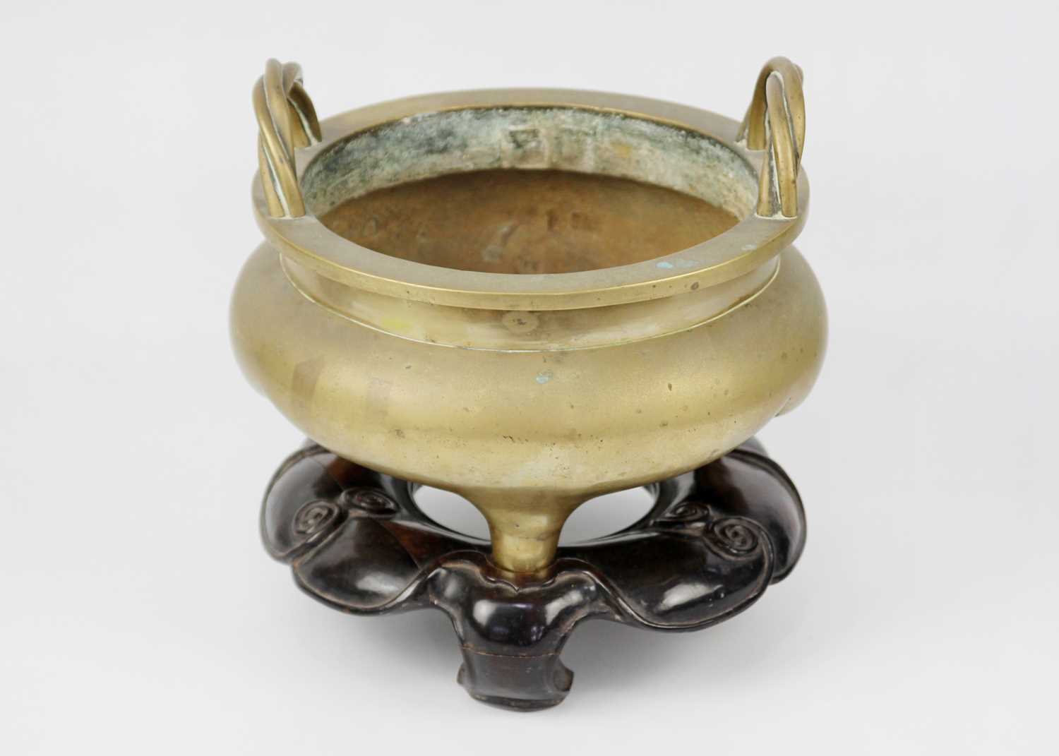 A large Chinese bronze twin-handled tripod censer on stand, Qing Dynasty. - Image 12 of 29