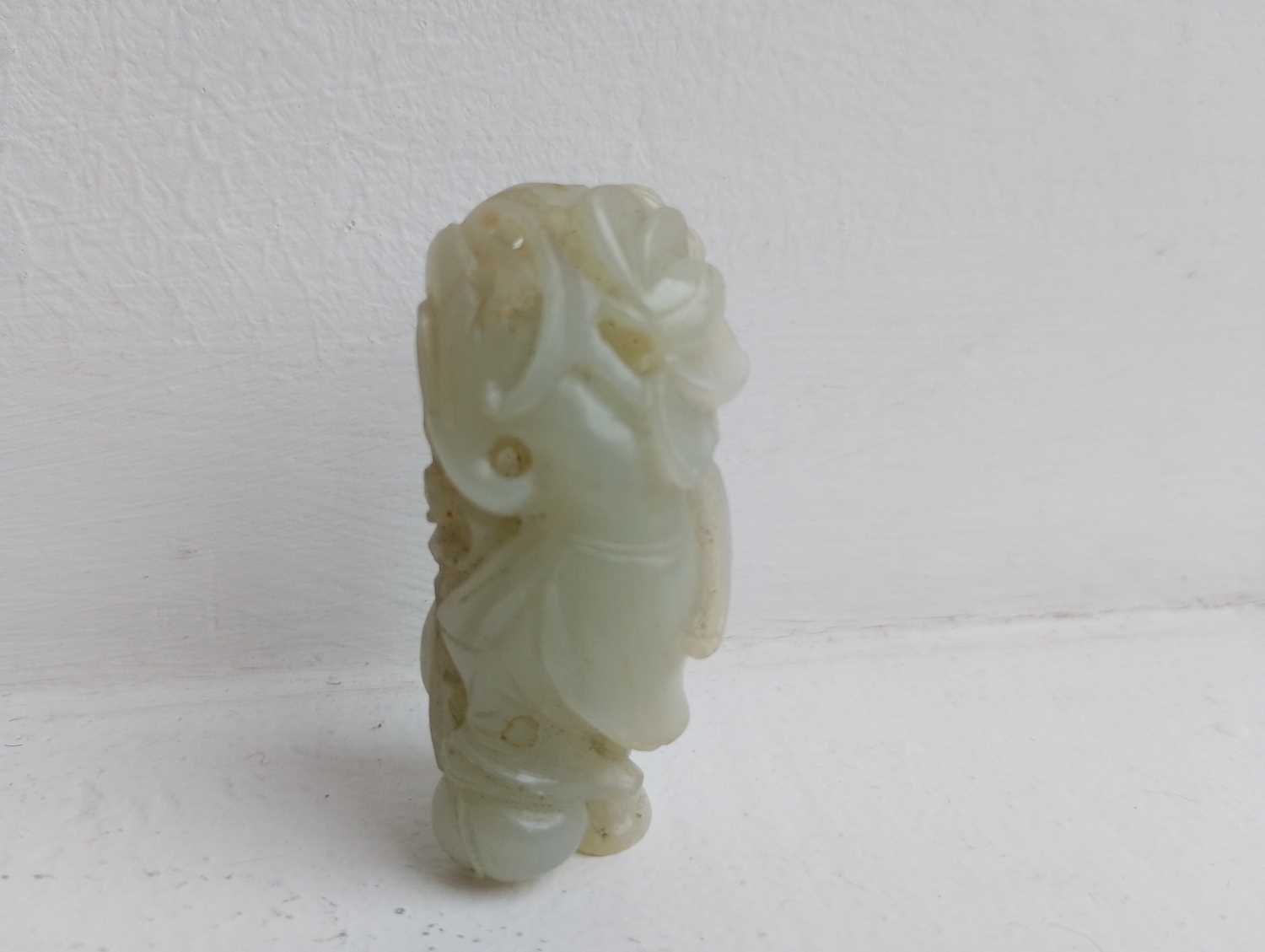 A Chinese carved jade figure of a boy, Qing Dynasty, 19th century, - Image 8 of 9
