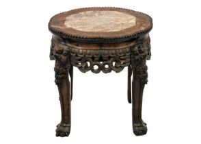 A Chinese hardwood marble top jardiniere stand, Qing Dynasty, late 19th century.