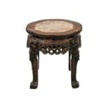 A Chinese hardwood marble top jardiniere stand, Qing Dynasty, late 19th century.