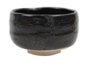 A Japanese raku-yaki ware chawan, signed, Showa period.