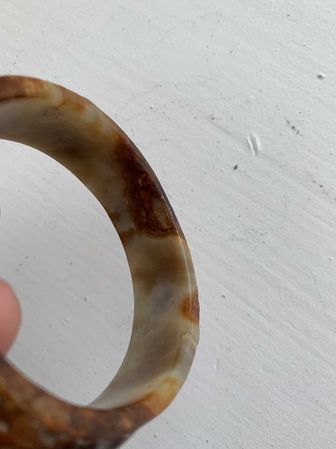 A Chinese carved jade bangle, probably Neolithic period. - Image 11 of 30