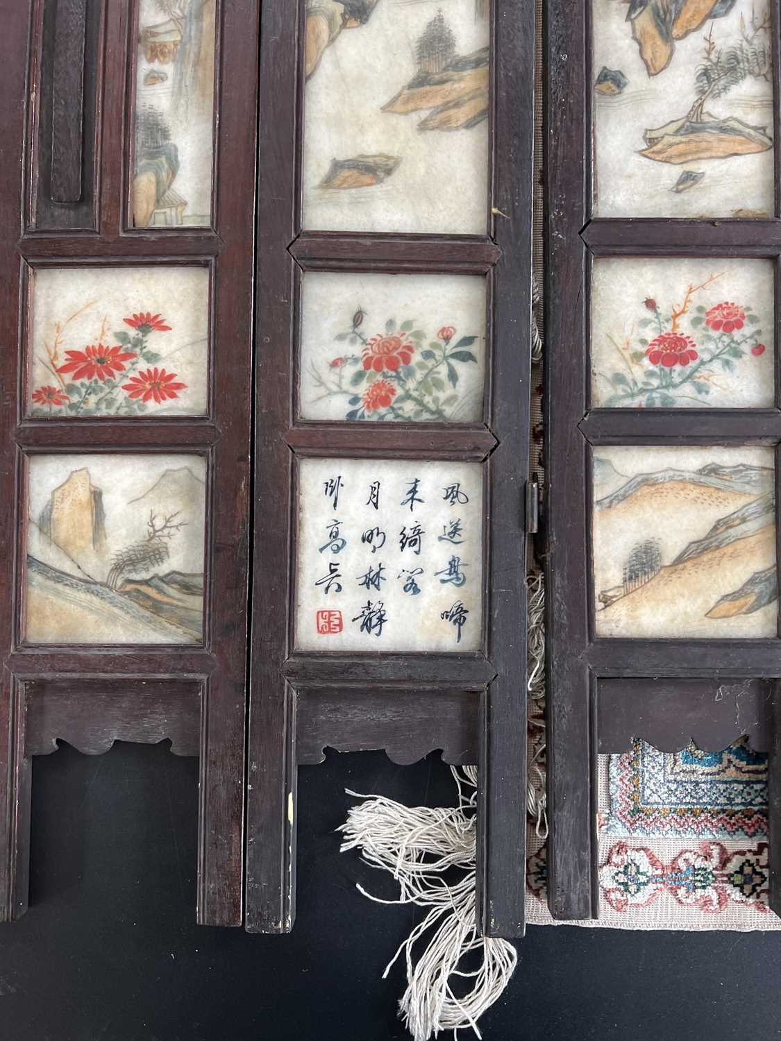 A Chinese alabaster and hardwood seven paneled screen, Qing Dynasty, late 19th century. - Image 14 of 16