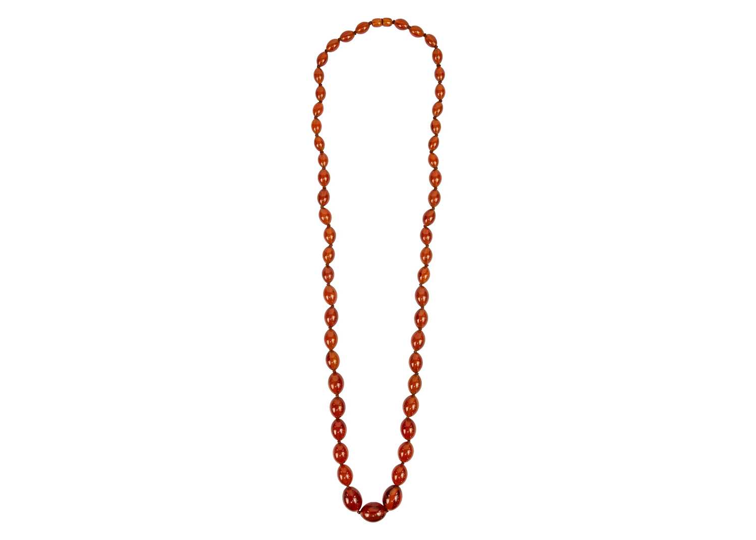 An amber style graduated oval bead necklace.