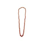 An amber style graduated oval bead necklace.