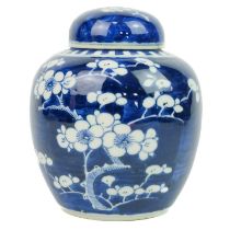 A Chinese blue & white prunus blossom pattern ginger jar & cover, circa 1900.
