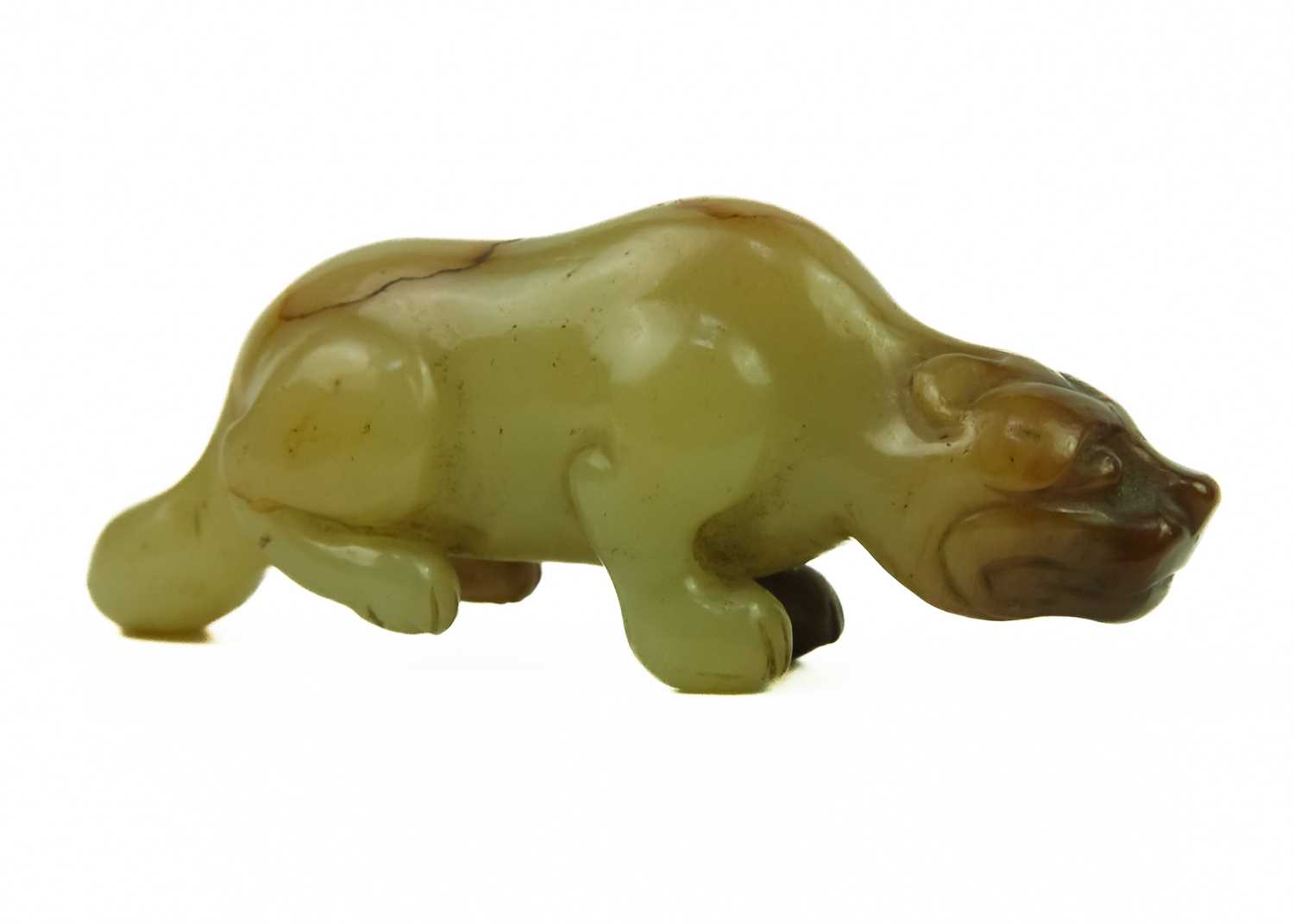 A Chinese russet jade tiger, Qing Dynasty, 19th century. - Image 6 of 25