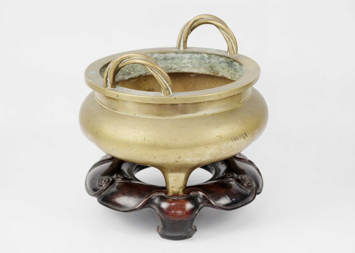 A large Chinese bronze twin-handled tripod censer on stand, Qing Dynasty. - Image 10 of 29