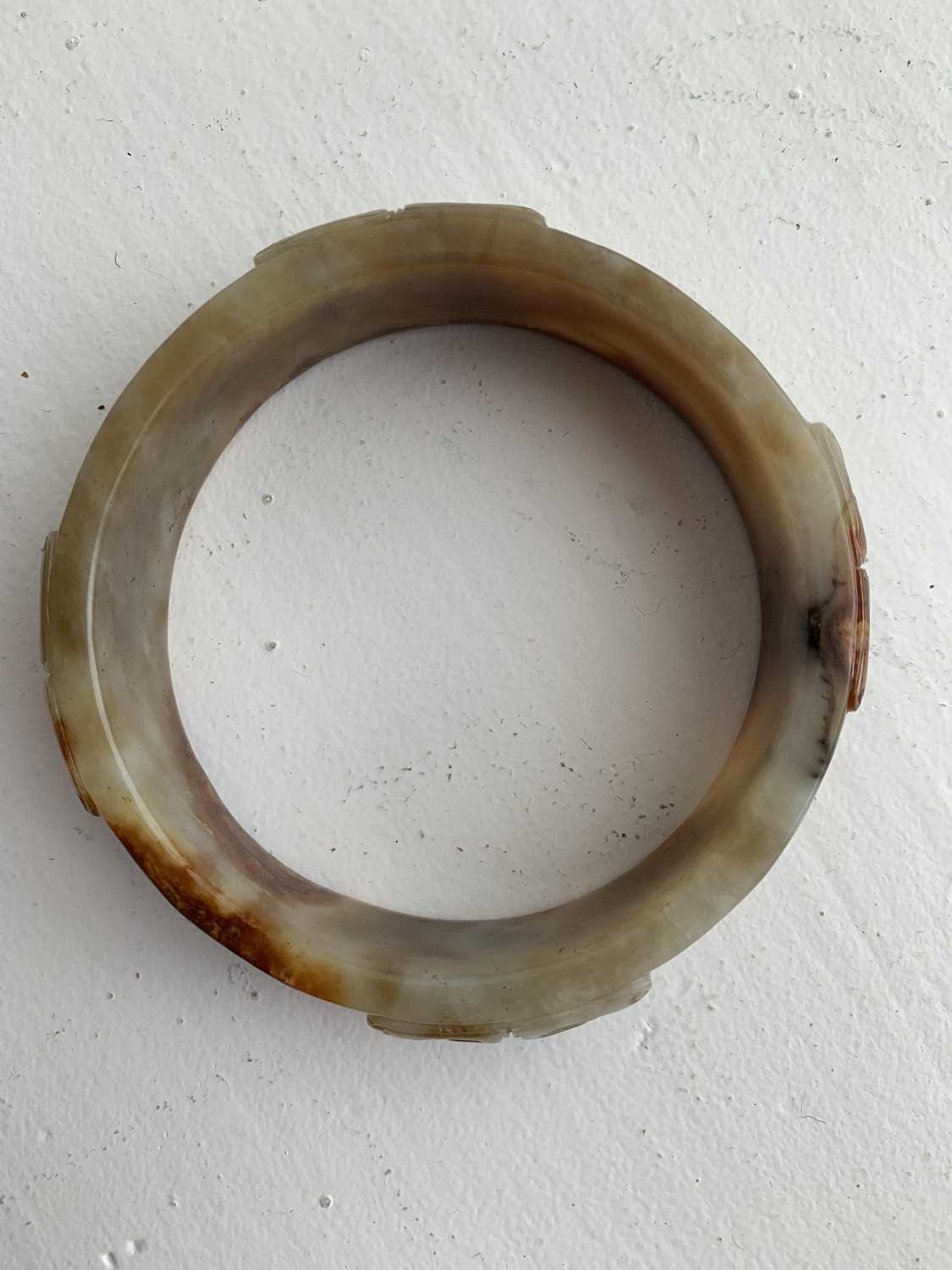 A Chinese carved jade bangle, probably Neolithic period. - Image 15 of 30