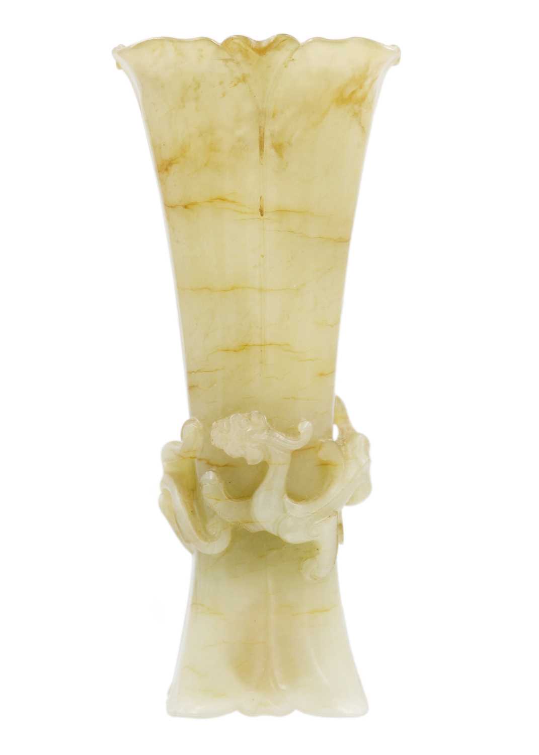 A Chinese pale green jade Gu vase, early Qing Dynasty.